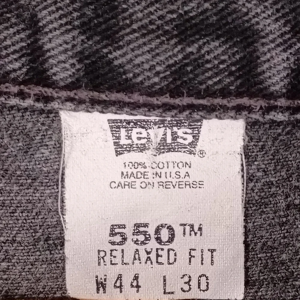 Vintage Levis 550 Relaxed Fit Made in USA Black Wash Jeans Mens 44x30 Fit 42x28